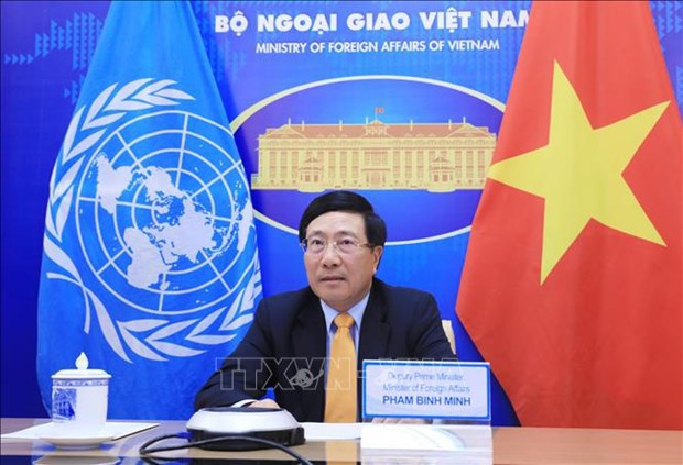 Заместитель премьер-министра, министр иностранных дел Фам Бинь Минь принял участие в онлаин-дискуссионнои сессии СБ ООН hinh anh 1