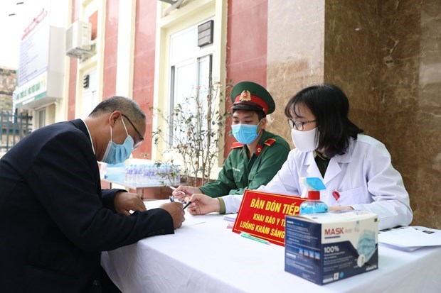 Первые 35 добровольцев получают инъекции вьетнамскои вакцины от COVID-19 на втором этапе испытании hinh anh 1