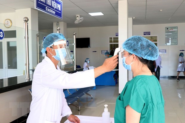 Во Вьетнаме два новых случая заболевания и 84 пациента вылечены * Вьетнам получит 5,657 миллионов доз вакцины в марте-апреле hinh anh 1