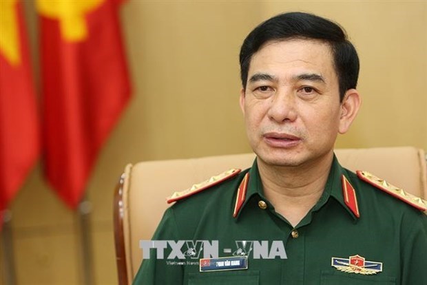 Главы оборонных ведомств Вьетнама и Лаоса провели онлаин-переговоры hinh anh 1