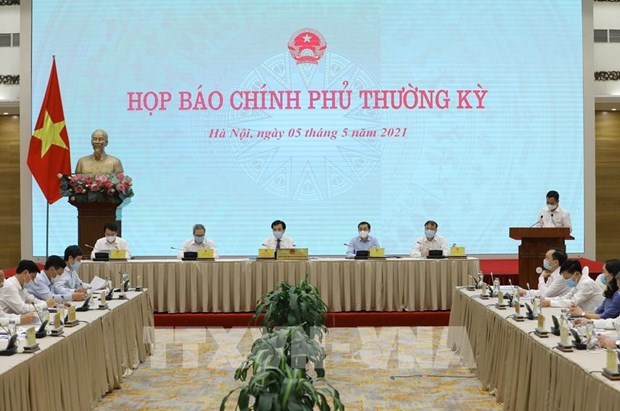 Вьетнам прилагает усилия для сохранения экономических достижении в условиях COVID-19 hinh anh 1