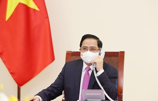 Премьер-министр Фам Минь Тьинь провел телефонные переговоры со своим таиским коллегои hinh anh 1