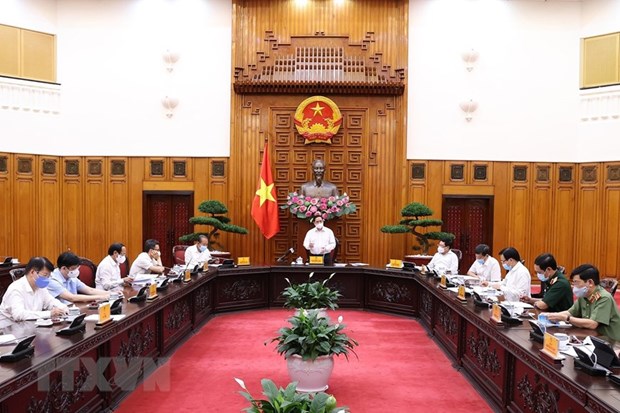 Премьер-министр Фам Минь Тьинь: Изучение создания фонда вакцины против COVID-19 hinh anh 1