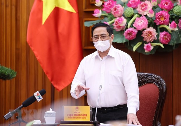 Премьер-министр Фам Минь Тьинь: Изучение создания фонда вакцины против COVID-19 hinh anh 2