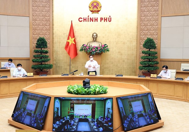 Премьер-министр Фам Минь Тьинь: Необходимо отразить эпидемию COVID-19 в двух провинциях Бакжанг и Бакнинь hinh anh 1