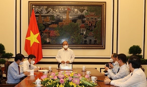 Президент Нгуен Суан Фук провел рабочее заседание с редакциеи журнала «Коммунист» hinh anh 1