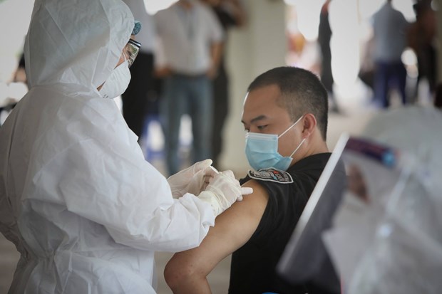 Вьетнам желает и дальше получать поддержку в доступе к вакцинам против COVID-19 hinh anh 1