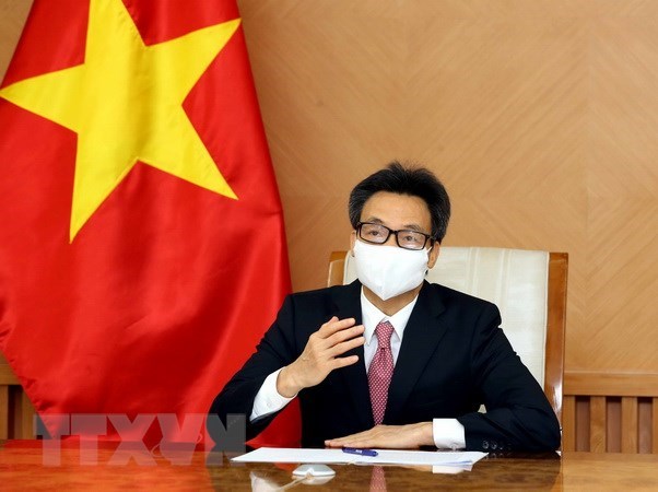 Заместитель премьер-министра Ву Дык Дам предложил ВОЗ ускорять поставку вакцины Вьетнаму hinh anh 1