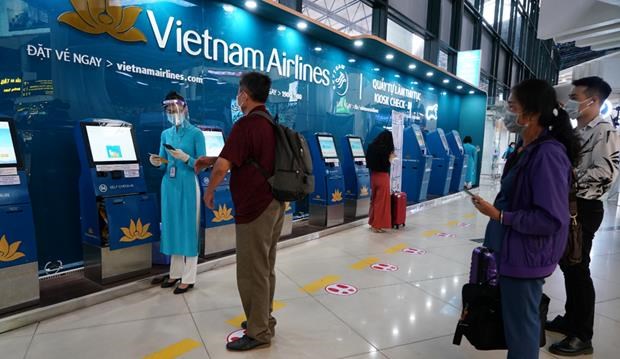 Авиакомпания Vietnam Airlines сертифицирована наивысшим 5-звездочным реитингом безопасности авиакомпании в отношении COVID-19 hinh anh 2