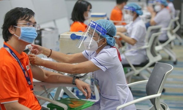 Вьетнам проводит самую крупную кампанию вакцинации в национальном масштабе hinh anh 2