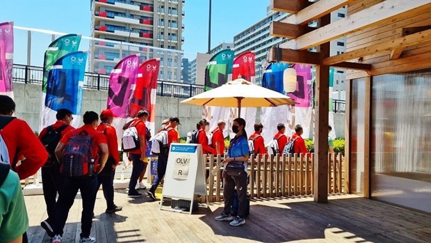 Олимпииские игры в Токио-2020: вьетнамцы в Японии спонсируют бесплатные передатчики Wi-Fi для вьетнамскои делегации hinh anh 1