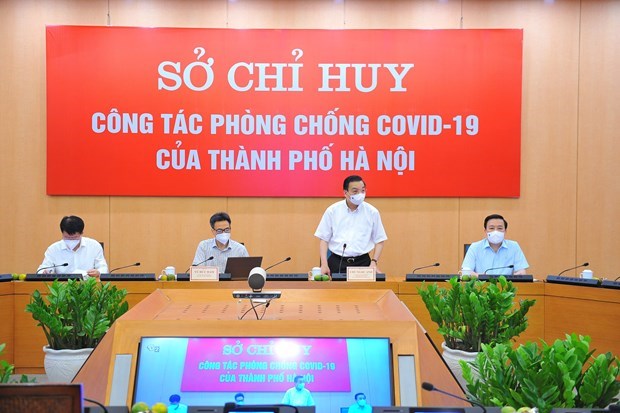 Заместитель премьер-министра проинспектировал меры по профилактике и борьбе с COVID-19 в Ханое hinh anh 2