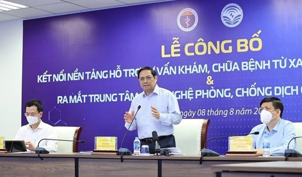 Премьер-министр Фам Минь Тьинь подтвердил важность системы телездравоохранения hinh anh 1