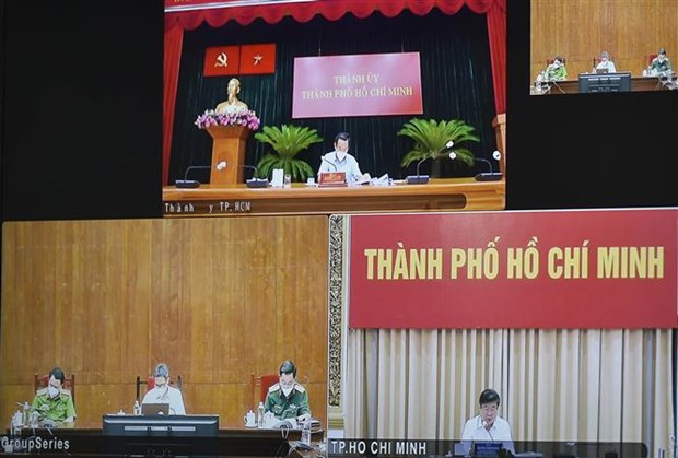 Заместитель премьер-министра Ву Дык Дам провел онлаин-встречу с лидерами Хошимина по профилактике и борьбе с COVID-19 hinh anh 2