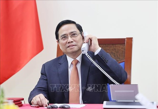 Премьер-министр провел телефонныи разговор с президентом Pfizer hinh anh 1