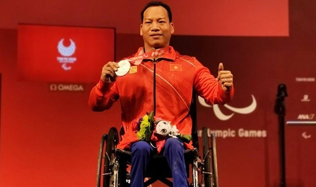 Ле Ван Конг завоевал серебряную медаль на Паралимпииских играх в Токио-2020 hinh anh 1
