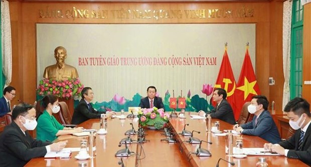 Партии Вьетнама и Китая стремятся к более тесному сотрудничеству в работе по пропаганде hinh anh 1
