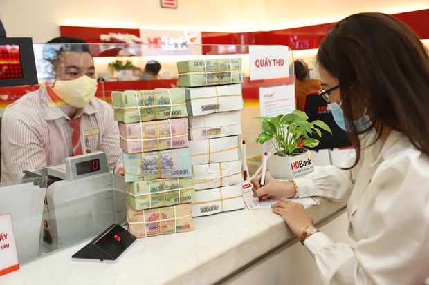 Госбанк Вьетнама официально продлил срок реструктуризации долга еще на 6 месяцев hinh anh 1