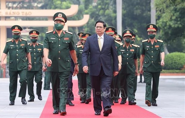 Премьер-министр Фам Минь Тьинь присутствовал на церемонии открытия учебного года Академии национальнои обороны hinh anh 2