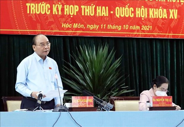Президент Нгуен Суан Фук: Правильно понять термин «противоэпидемическая крепость», чтобы не допустить «глухого блокирования» hinh anh 1