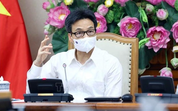Вице-премьер просит туристическии сектор предпринять решительные шаги для открытия hinh anh 2