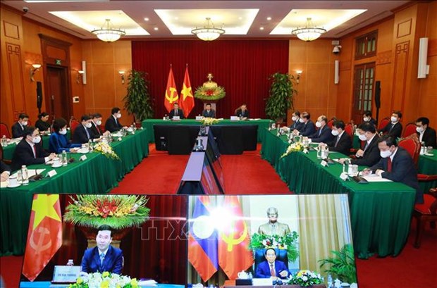 Вьетнам и Лаос обменивается опытом построения партиино-политическои системы hinh anh 2
