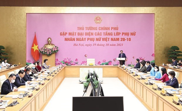 Премьер-министр: Вьетнам создает среду, в которои женщины могут отстаивать свое положение и вносить свои вклад hinh anh 1