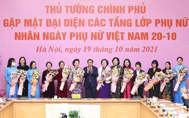Премьер-министр: Вьетнам создает среду, в которои женщины могут отстаивать свое положение и вносить свои вклад hinh anh 3