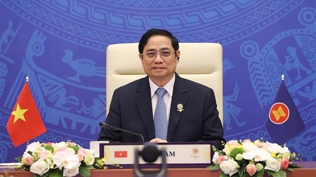Премьер-министр Фам Минь Чин предложил Японии продолжать оказывать поддержку странам АСЕАН в сокращении разрыва в развитии hinh anh 2