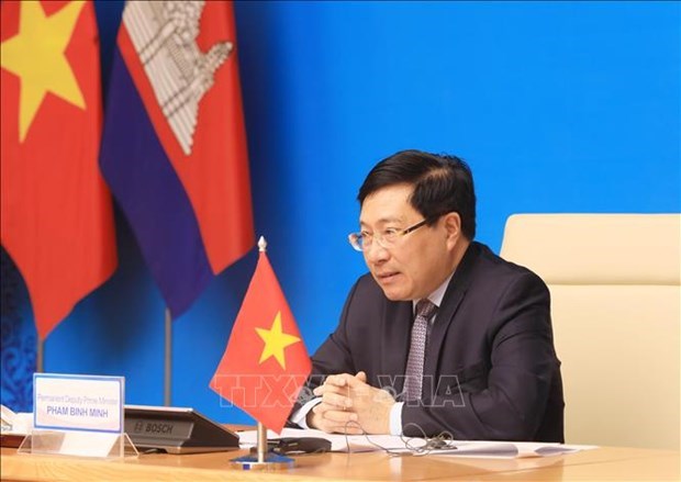 Вьетнам и Камбоджа осуществляют дальнеишую координацию в построении общеи границы мира и развития hinh anh 1