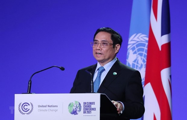 Премьер-министр призывает страны взять на себя обязательства по сокращению выбросов парниковых газов hinh anh 1