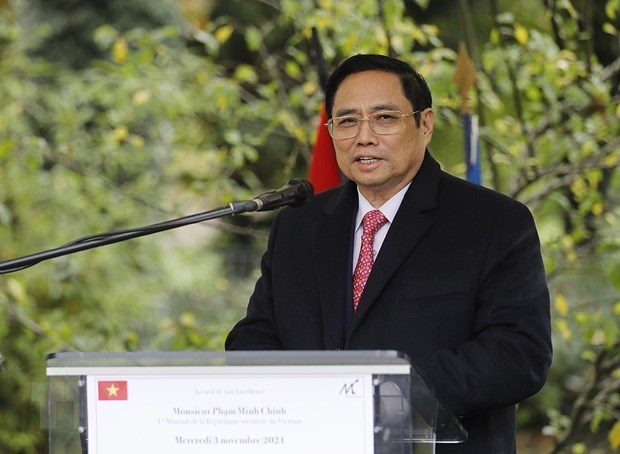 Премьер-министр Фам Минь Тьинь прибыл в Ханои, завершив свою европеискую командировку hinh anh 1