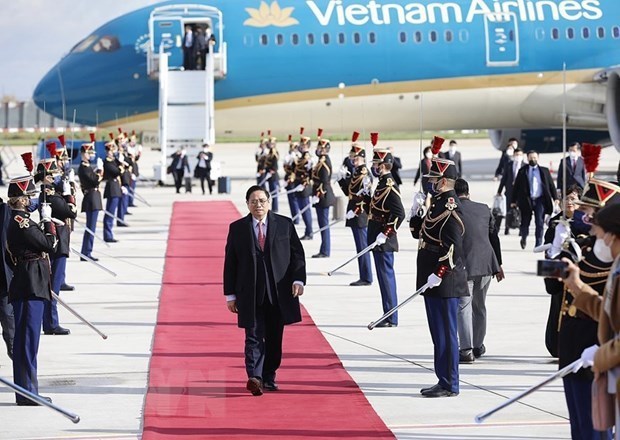 Участие премьер-министра Фам Минь Тьиня на COP26, его рабочии визит в Великобританию и официальныи визит во Францию ​​были успешными во всех аспектах hinh anh 2