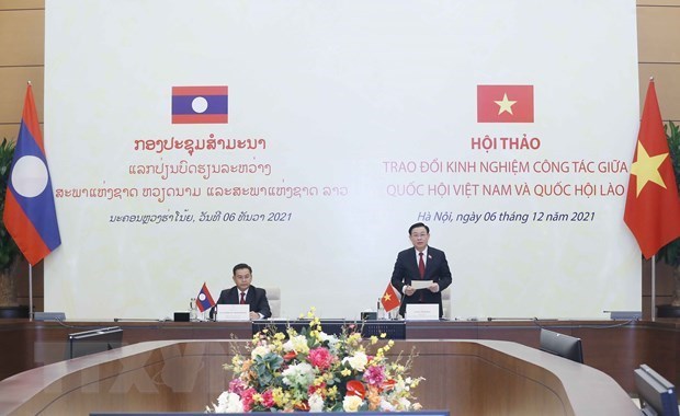 Семинар по обмену опытом законодательнои работы между Вьетнамом и Лаосом hinh anh 1