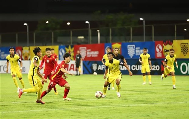 Вьетнам обыграл Малаизию со счетом 3:0 и возглавил группу B на AFF Suzuki Cup hinh anh 1