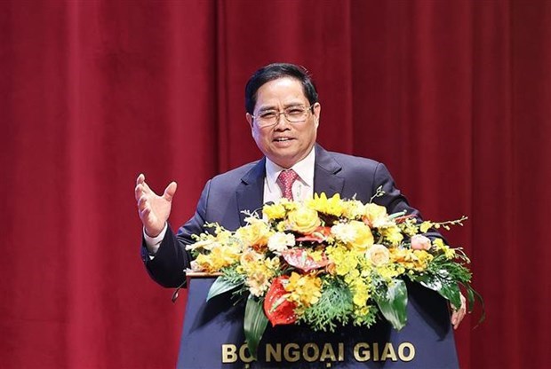 Премьер-министр Фам Минь Тьинь: дипломатия должна демонстрировать «чувство, искренность, доверие, справедливость, уважение, эффективность, развитие» hinh anh 1