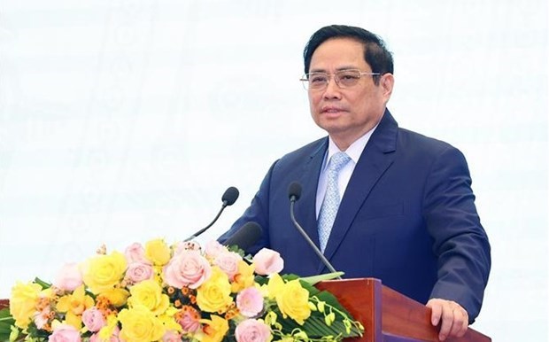 Премьер-министр Фам Минь Тьинь: Люди и предприятия являются центром и субъектами в разработке и применении права hinh anh 1