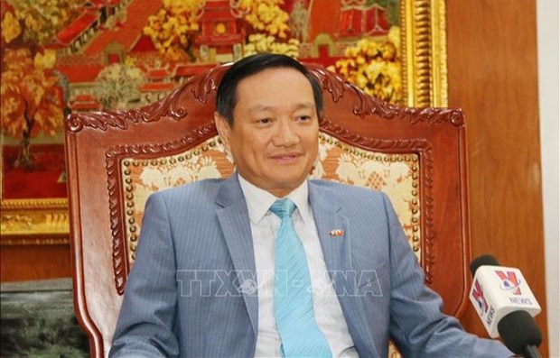 Визит премьер-министра Лаоса во Вьетнам создаст движущую силу для продвижения всестороннего сотрудничества в 2022 году hinh anh 2