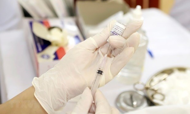 ПМ требует организовать исследование вакцинации от COVID-19 для детеи от 5 лет hinh anh 1
