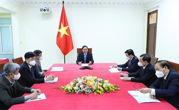Телефонныи разговор Фам Минь Тьиня с премьер-министром Китая: Создать совместную рабочую группу по упрощению экспорта hinh anh 2