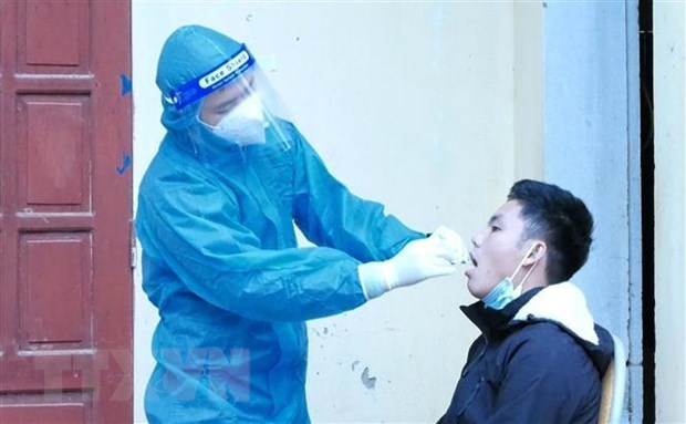 17 января во Вьетнаме зарегистрировано еще 16.378 случаев заражения COVID-19 hinh anh 1