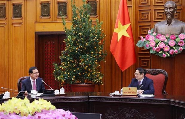 Премьер-министр Фам Минь Тьинь приветствует расширение инвестиции Samsung во Вьетнаме hinh anh 1