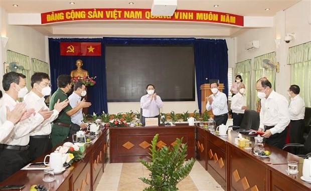 Премьер-министр: Хошимин «смело идти вперед» в профилактике и борьбе с эпидемиеи hinh anh 2