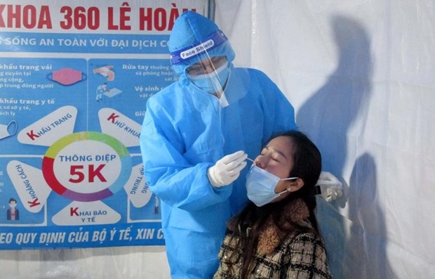 Вьетнам зафиксировал 26.487 новых случаев COVID-19 на 11 февраля hinh anh 1