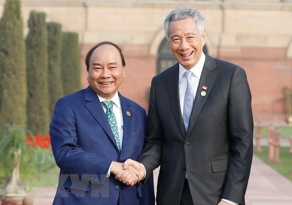 Сингапурские СМИ освещают предстоящии визит президента Вьетнама hinh anh 1