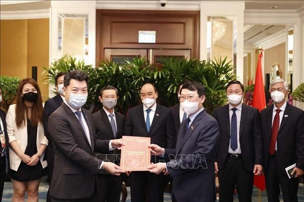 Президент государства Нгуен Суан Фук принял ведущие компании финансового и энергетического секторов Сингапура hinh anh 1