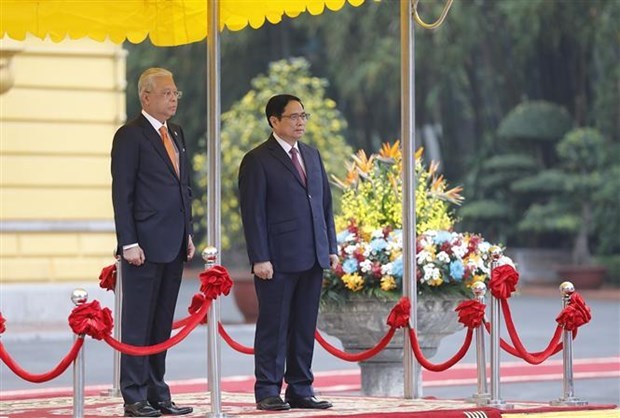 Церемония встречи премьер-министра Малаизии hinh anh 3