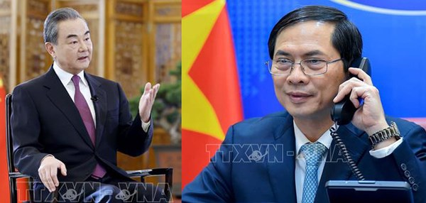Главы МИД Вьетнама и Китая провели телефонные переговоры hinh anh 1