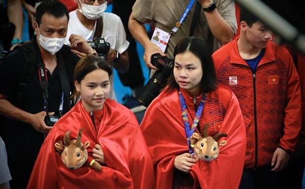 SEA Games 31: Вьетнам завоевал вторую серебряную медаль в прыжках в воду hinh anh 1
