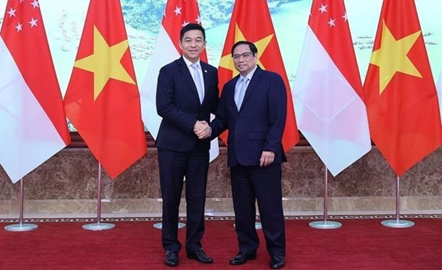 Премьер-министр Фам Минь Тьинь встретился со спикером парламента Сингапура hinh anh 1